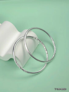 beautiful teen girl holding wall clock over blue b 2023 11 27 05 01 58 utc